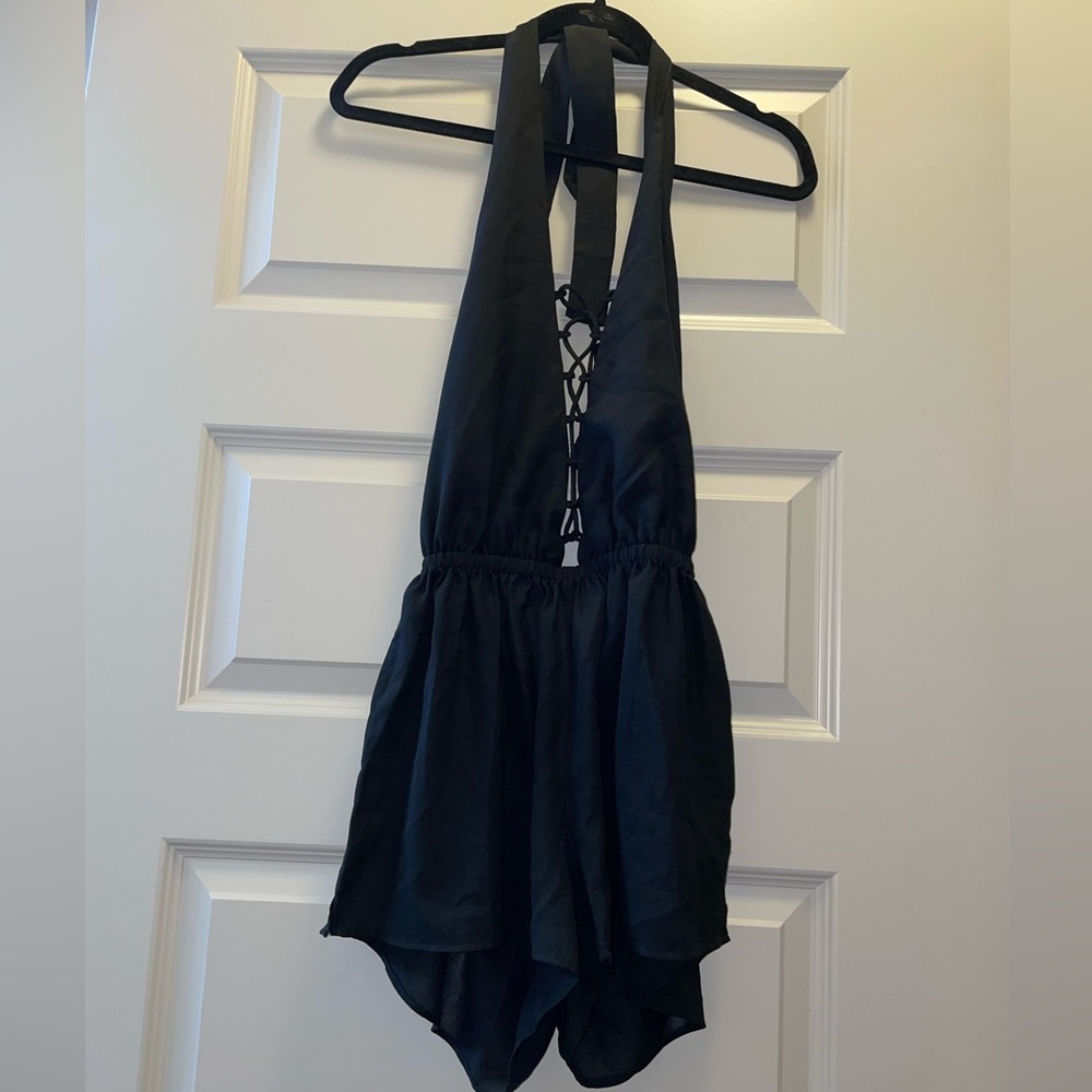 Black lace up halter backless romper size small